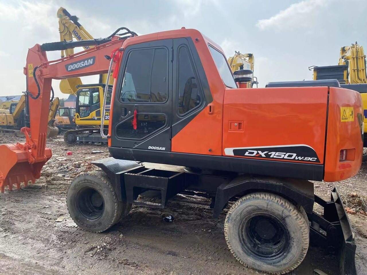 Колёсный экскаватор Doosan DX150W: фото 9