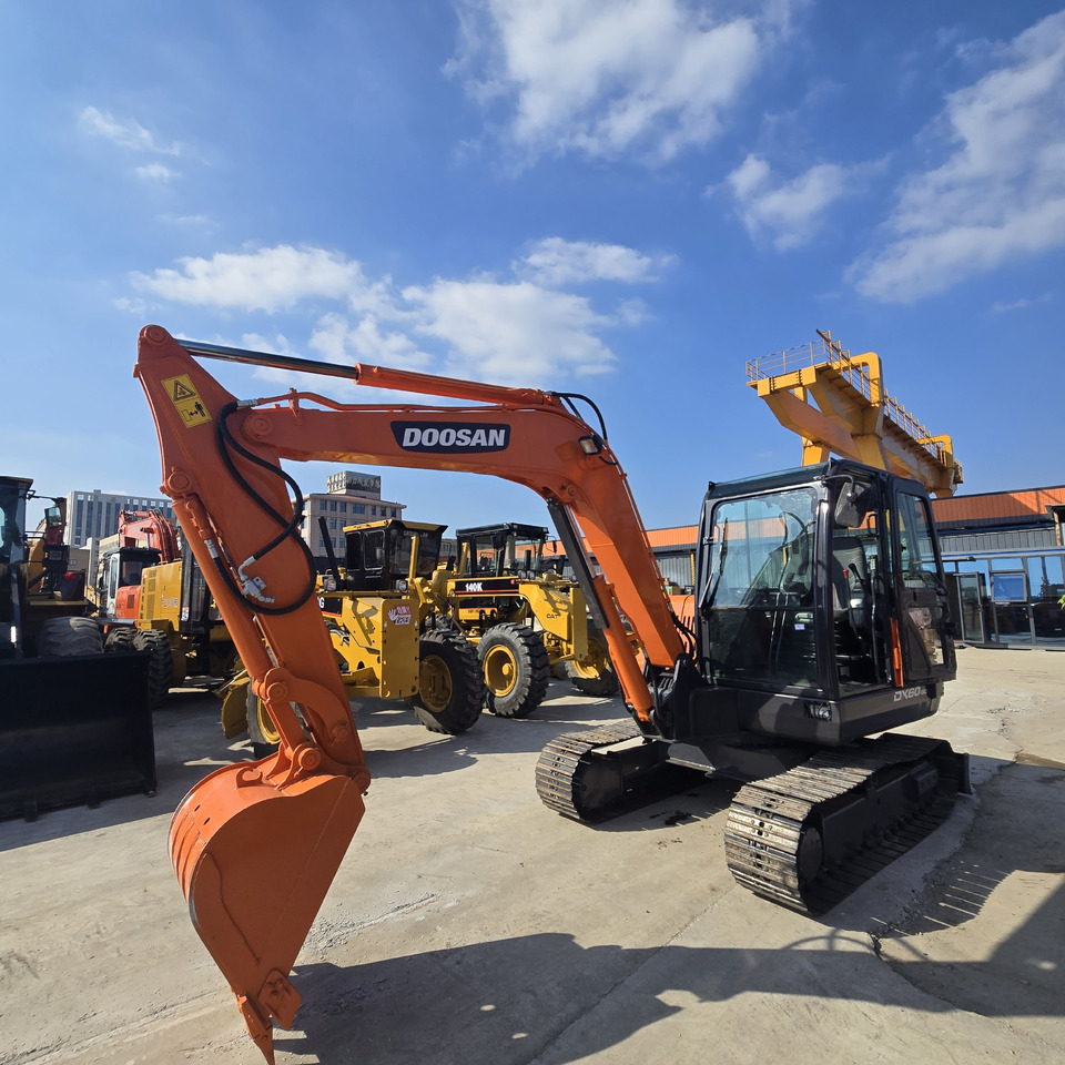 Doosan DX60 - Мини-экскаватор: фото 1 Doosan DX60 - Мини-экскаватор: фото 1