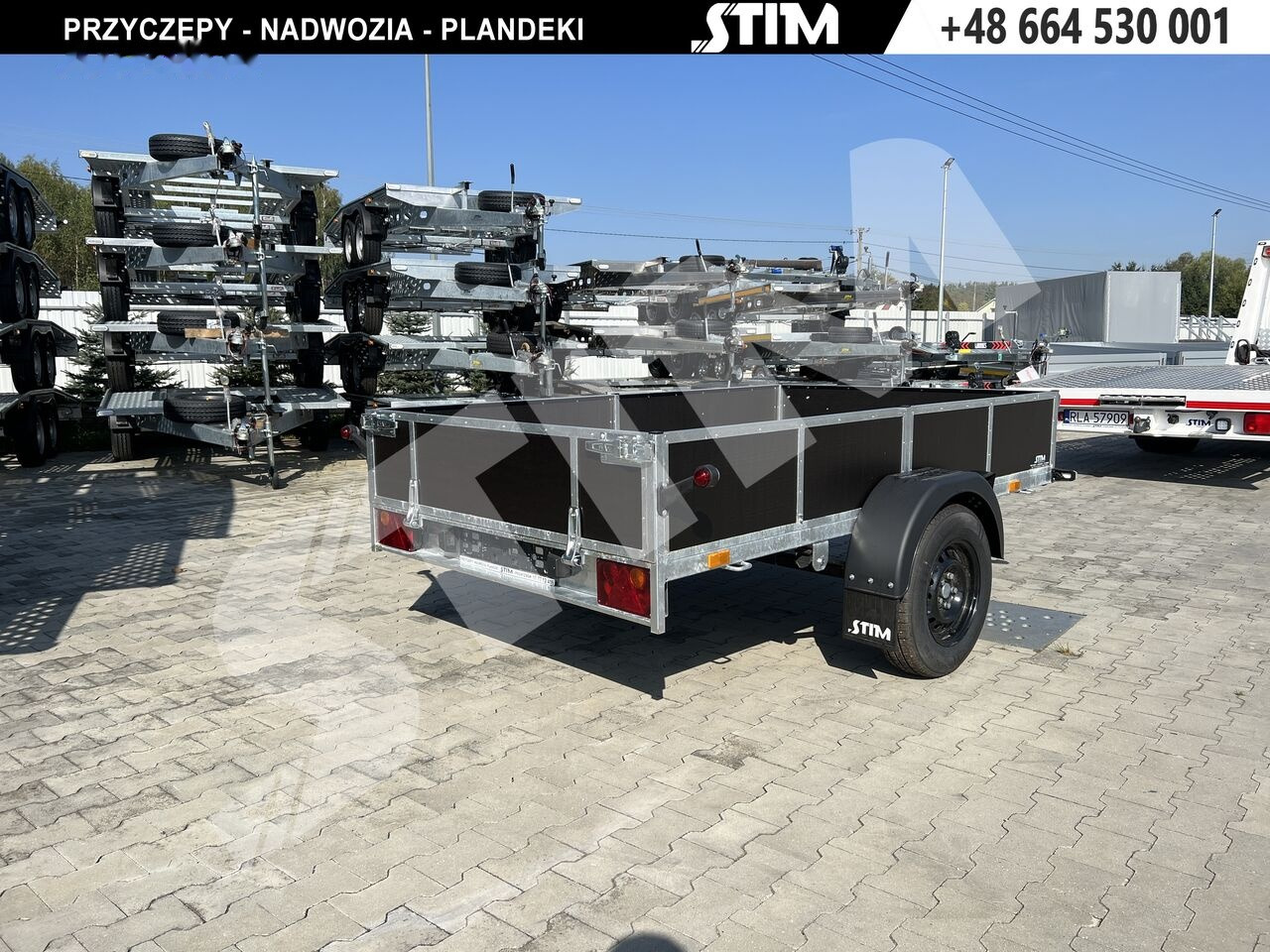 Stim S11-075/2615R + przednia burta otwierana - Прицеп для легкового автомобиля: фото 2 Stim S11-075/2615R + przednia burta otwierana - Прицеп для легкового автомобиля: фото 2