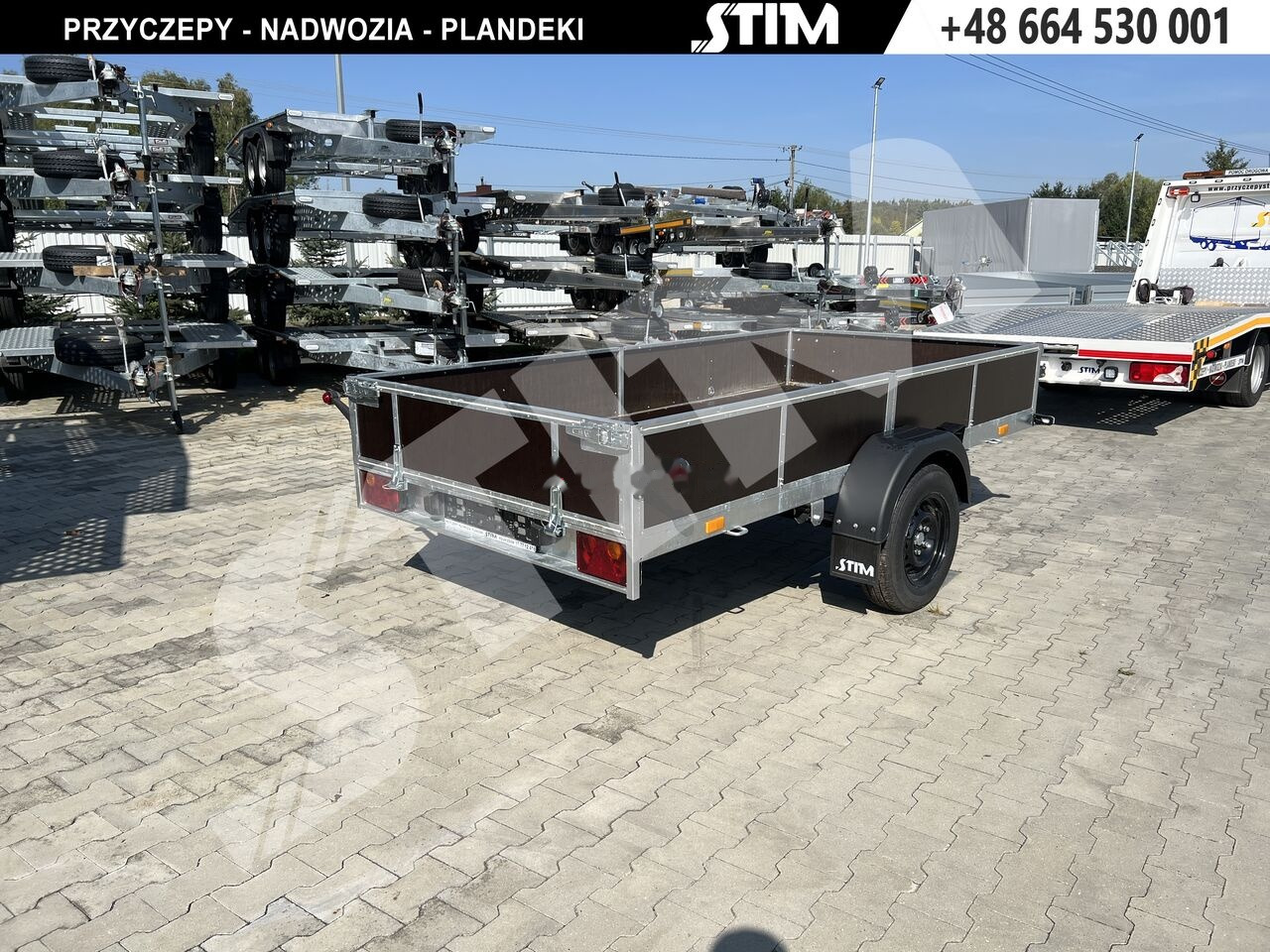 Stim S11-075/3115R + przednia burta otwierana + wzmocnienie ramy - Прицеп для легкового автомобиля: фото 1 Stim S11-075/3115R + przednia burta otwierana + wzmocnienie ramy - Прицеп для легкового автомобиля: фото 1