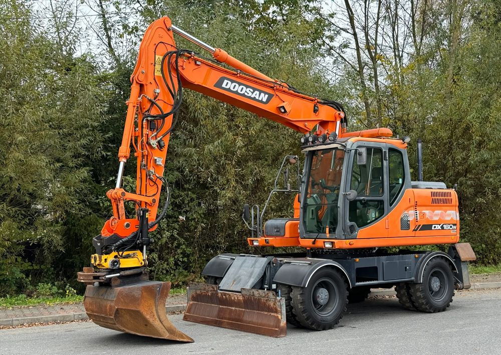 Doosan * DOOSAN DX160W *ROTOTILT* GPS 2D Leica * Sprowadzona * Stan Perfekcyjny * Koparka Kołowa * - Колёсный экскаватор: фото 1 Doosan * DOOSAN DX160W *ROTOTILT* GPS 2D Leica * Sprowadzona * Stan Perfekcyjny * Koparka Kołowa * - Колёсный экскаватор: фото 1
