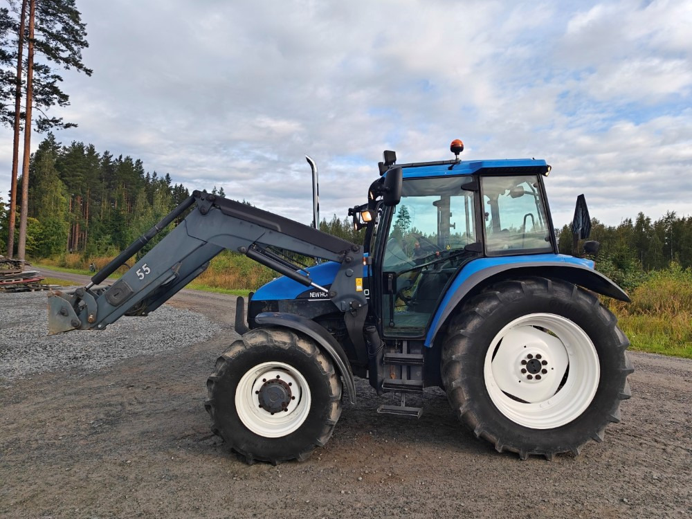 New Holland TS100, ES vaihteisto, ilmastointi, etukuormaaja Ålö Q55, katso video! - Трактор: фото 2 New Holland TS100, ES vaihteisto, ilmastointi, etukuormaaja Ålö Q55, katso video! - Трактор: фото 2