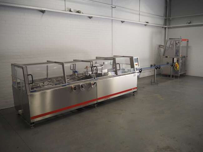 Schut Systems carton line EM60 - Упаковочное оборудование: фото 1 Schut Systems carton line EM60 - Упаковочное оборудование: фото 1