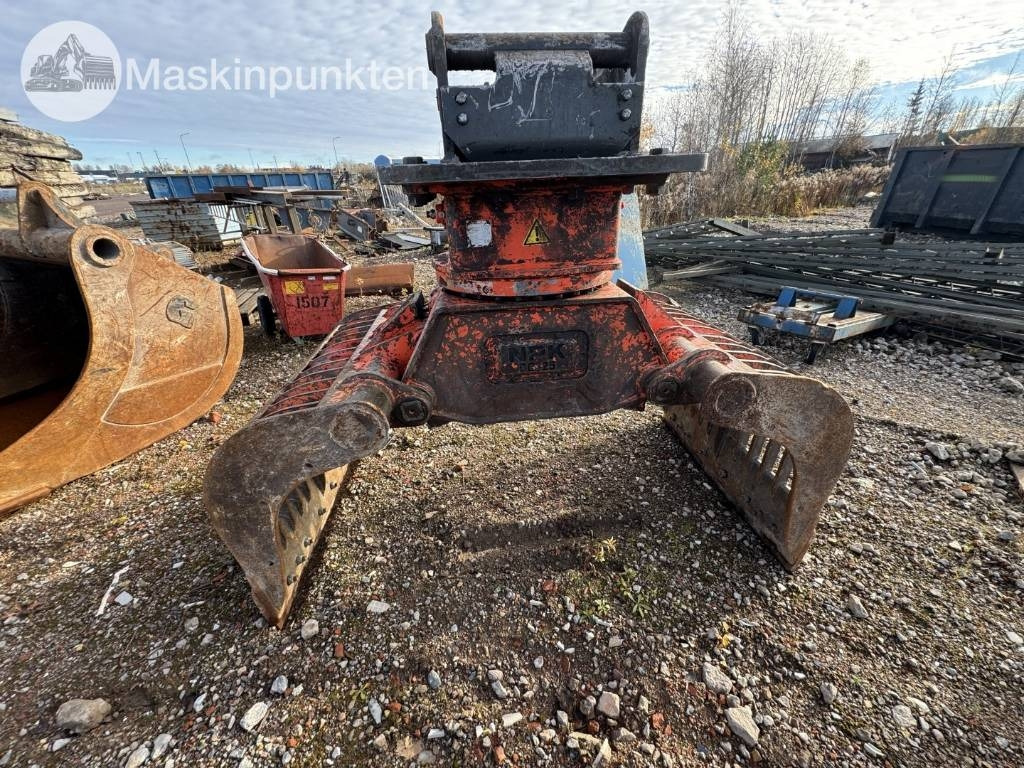 NPK DC-25 - Грейфер для Строительной техники: фото 1 NPK DC-25 - Грейфер для Строительной техники: фото 1