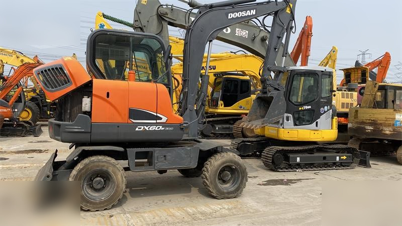 DOOSAN DX60W ECO - Колёсный экскаватор: фото 1 DOOSAN DX60W ECO - Колёсный экскаватор: фото 1