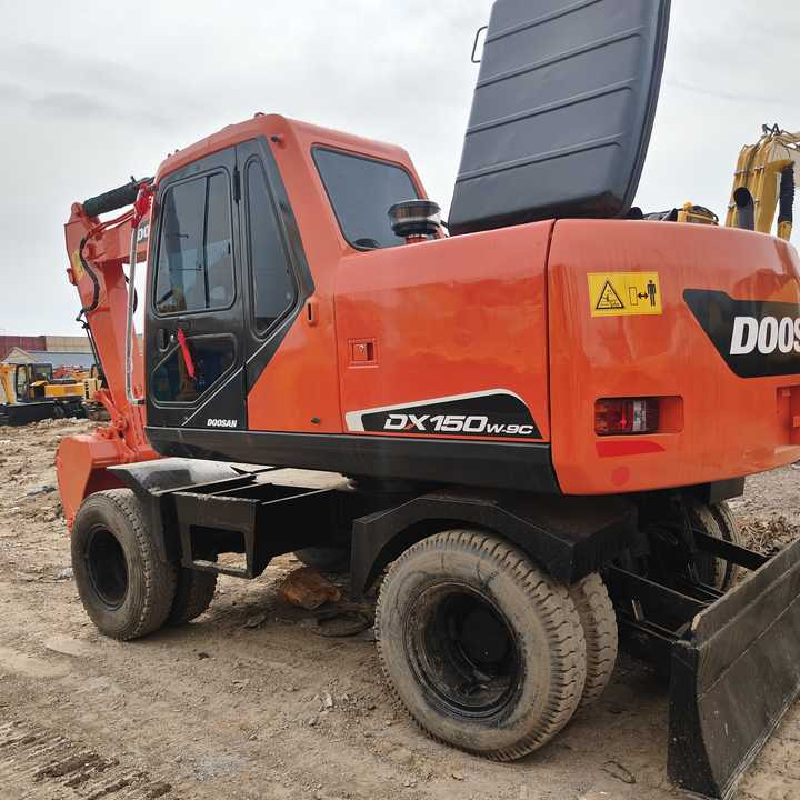 Used Original Doosan Dx150w-9 Wheel Excavator for Sale - Колёсный экскаватор: фото 1 Used Original Doosan Dx150w-9 Wheel Excavator for Sale - Колёсный экскаватор: фото 1