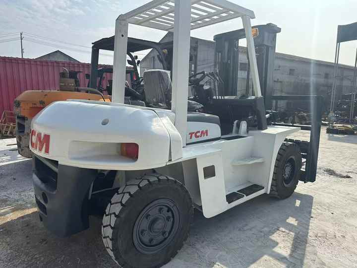 High Quality TCM 7 Ton with Hydraulic Distance Adjustment Used Forklift in Stock Used tcm Forklift 7 Ton Used tcm Fd70 Forklift - Вилочный погрузчик: фото 2 High Quality TCM 7 Ton with Hydraulic Distance Adjustment Used Forklift in Stock Used tcm Forklift 7 Ton Used tcm Fd70 Forklift - Вилочный погрузчик: фото 2