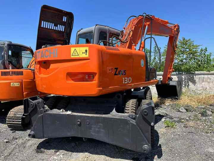 Used Wheel Excavator Hitachi ZX 130W Made in Japan 13tonHitachi Zx130w Wheel Excavator Price Used Hitachi Zx130 Excavator SALE - Экскаватор: фото 2 Used Wheel Excavator Hitachi ZX 130W Made in Japan 13tonHitachi Zx130w Wheel Excavator Price Used Hitachi Zx130 Excavator SALE - Экскаватор: фото 2