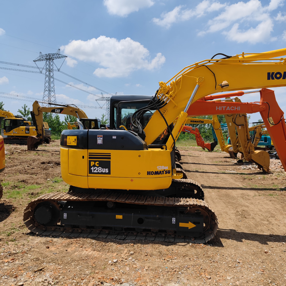 KOMATSU PC128US - Гусеничный экскаватор: фото 1 KOMATSU PC128US - Гусеничный экскаватор: фото 1