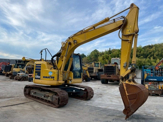 KOMATSU PC128US-10 - Гусеничный экскаватор: фото 2 KOMATSU PC128US-10 - Гусеничный экскаватор: фото 2