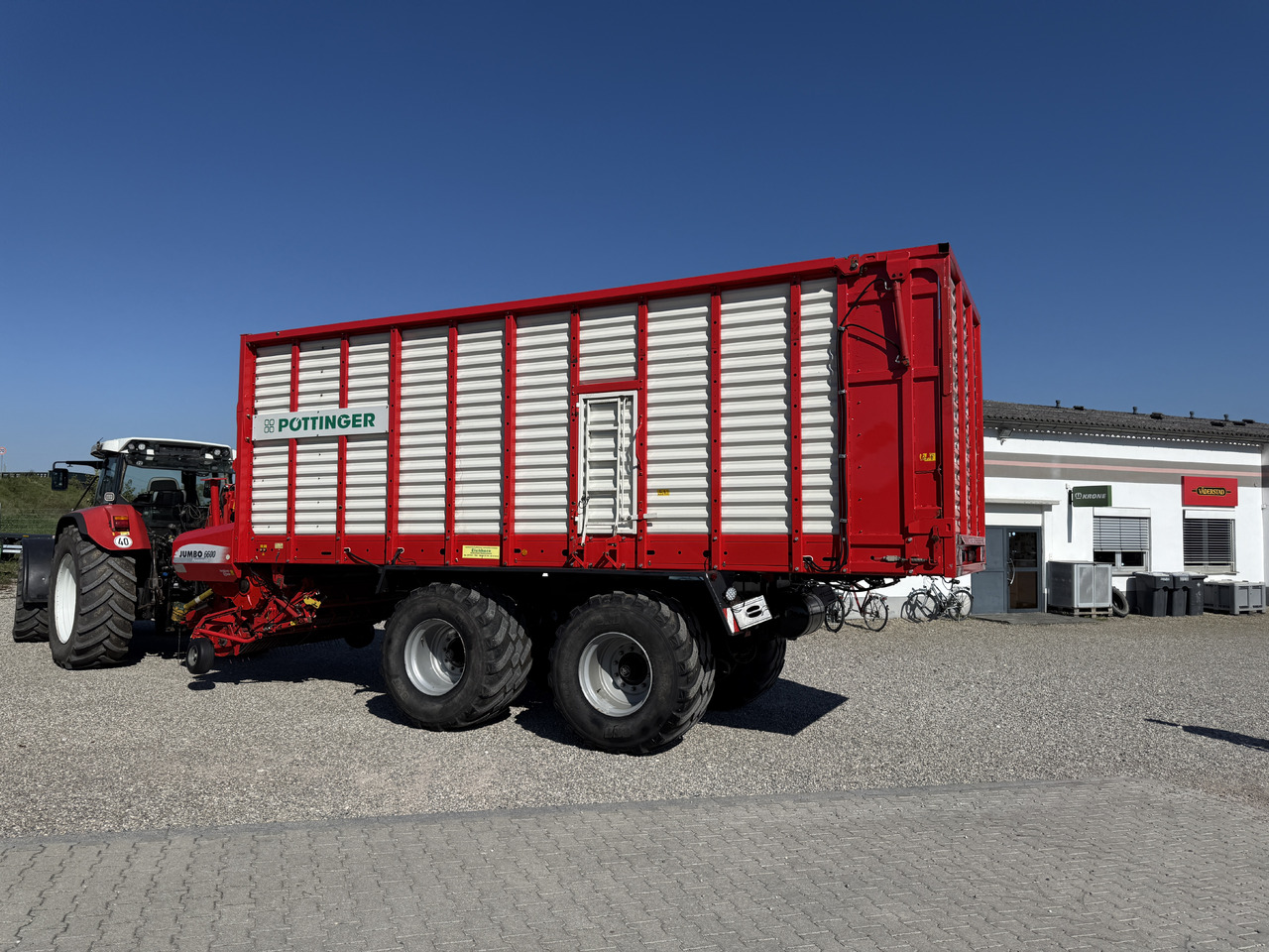 PÖTTINGER Jumbo 6600 L - Тележка для жатки: фото 1 PÖTTINGER Jumbo 6600 L - Тележка для жатки: фото 1