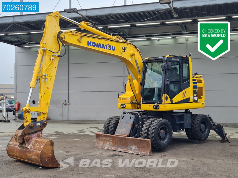 Komatsu PW148 -11 - Колёсный экскаватор: фото 1 Komatsu PW148 -11 - Колёсный экскаватор: фото 1
