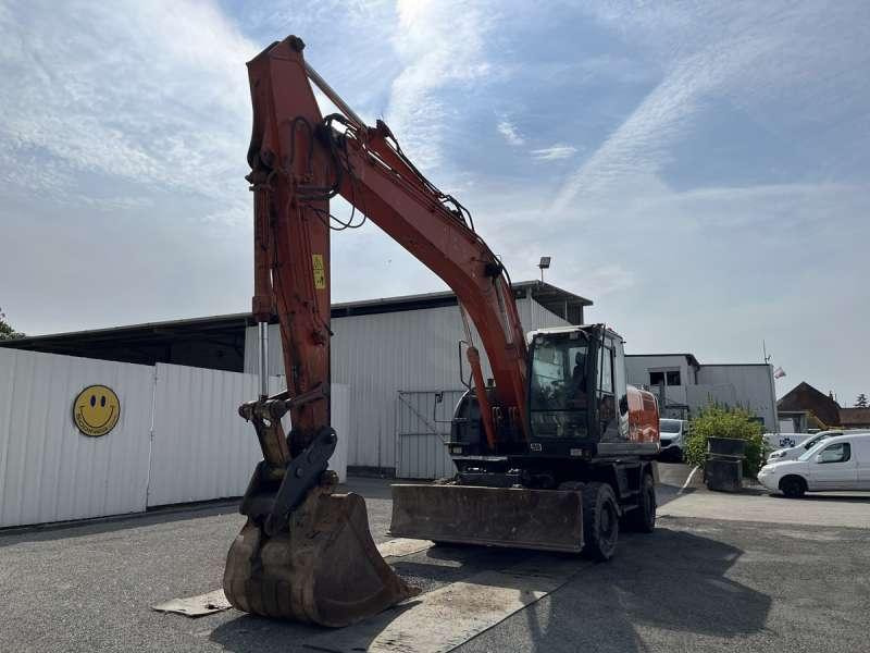 Hitachi ZX210W-3 - Колёсный экскаватор: фото 2 Hitachi ZX210W-3 - Колёсный экскаватор: фото 2
