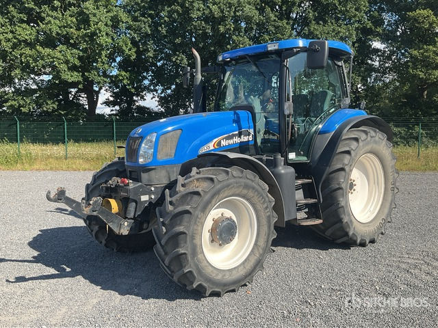 2004 New Holland TS135 A 4WD Tractor - Трактор: фото 1 2004 New Holland TS135 A 4WD Tractor - Трактор: фото 1