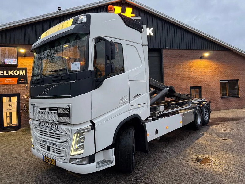 Volvo FH 460 6X2 VDL 25T Haakarm Standairco 9T Vooras Stuuras NL Truck - Крюковой мультилифт: фото 1 Volvo FH 460 6X2 VDL 25T Haakarm Standairco 9T Vooras Stuuras NL Truck - Крюковой мультилифт: фото 1