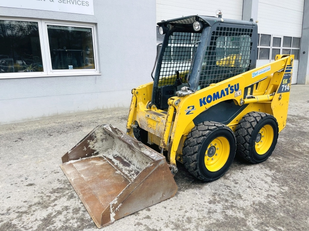 Komatsu SK714-5 (3948) - Мини-погрузчик с бортовым поворотом: фото 4 Komatsu SK714-5 (3948) - Мини-погрузчик с бортовым поворотом: фото 4