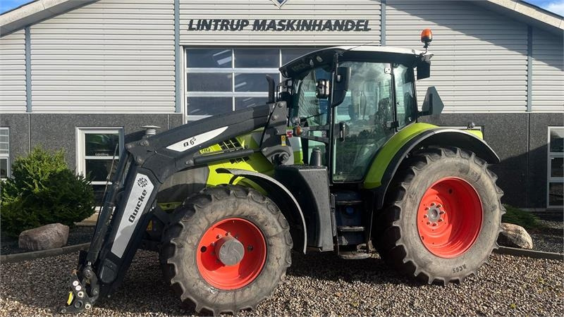 Claas ARION 650 CIS+ Focus med frontlift og frontlæsser - Трактор: фото 1 Claas ARION 650 CIS+ Focus med frontlift og frontlæsser - Трактор: фото 1