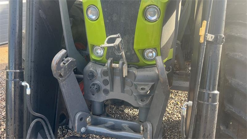 Claas ARION 650 CIS+ Focus med frontlift og frontlæsser - Трактор: фото 4 Claas ARION 650 CIS+ Focus med frontlift og frontlæsser - Трактор: фото 4