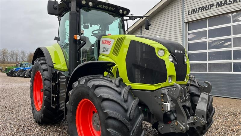 Трактор Claas Axion 830 Med frontlift. Velholdt traktor.: фото 13