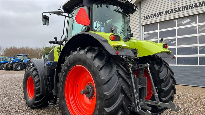 Трактор Claas Axion 830 Med frontlift. Velholdt traktor.: фото 11