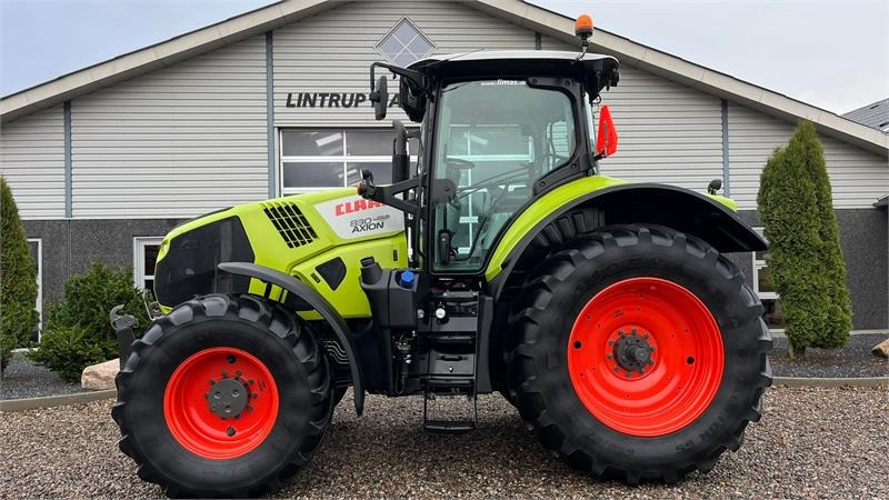 Claas Axion 830 Med frontlift. Velholdt traktor. - Трактор: фото 1 Claas Axion 830 Med frontlift. Velholdt traktor. - Трактор: фото 1