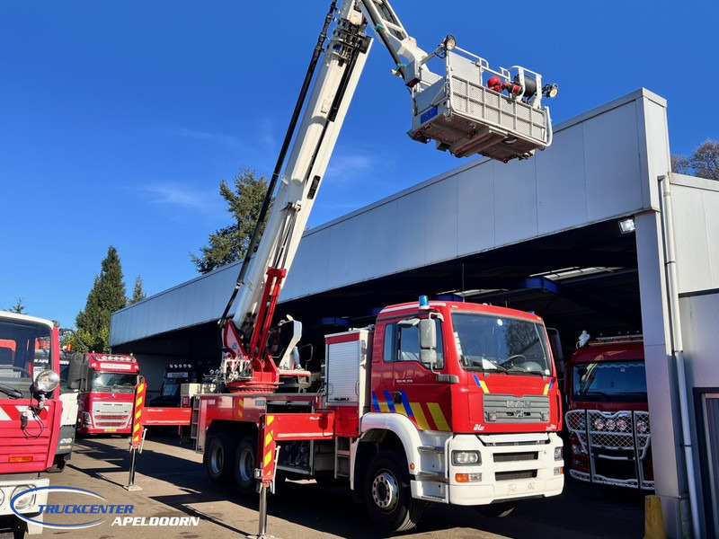 MAN TGA 26.350 Magirus ALP 320L = 32 meter, Waterpump, 6x4, Steel springs - Пожарная машина: фото 2 MAN TGA 26.350 Magirus ALP 320L = 32 meter, Waterpump, 6x4, Steel springs - Пожарная машина: фото 2