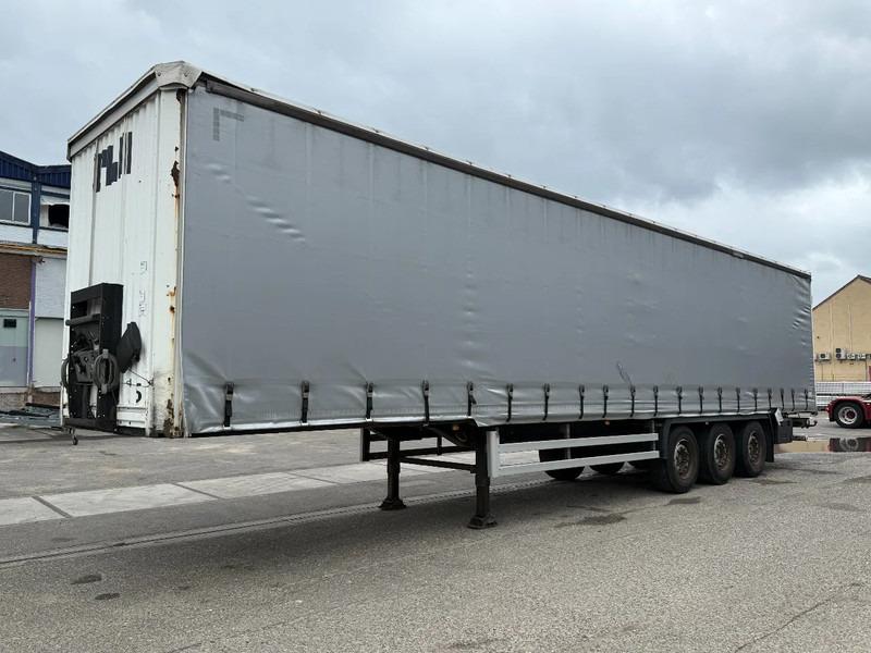 Kässbohrer XS - 3 AXLE - SAF + SLIDING ROOF - DISC BRAKES - Тентованный полуприцеп: фото 1 Kässbohrer XS - 3 AXLE - SAF + SLIDING ROOF - DISC BRAKES - Тентованный полуприцеп: фото 1