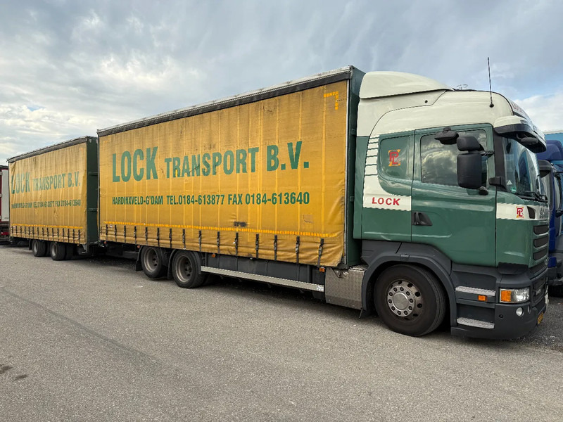 Scania R450 6X2 + DRACO AANHANGER 2010 TUV TILL 17-08-2026 - Тентованный грузовик: фото 1 Scania R450 6X2 + DRACO AANHANGER 2010 TUV TILL 17-08-2026 - Тентованный грузовик: фото 1