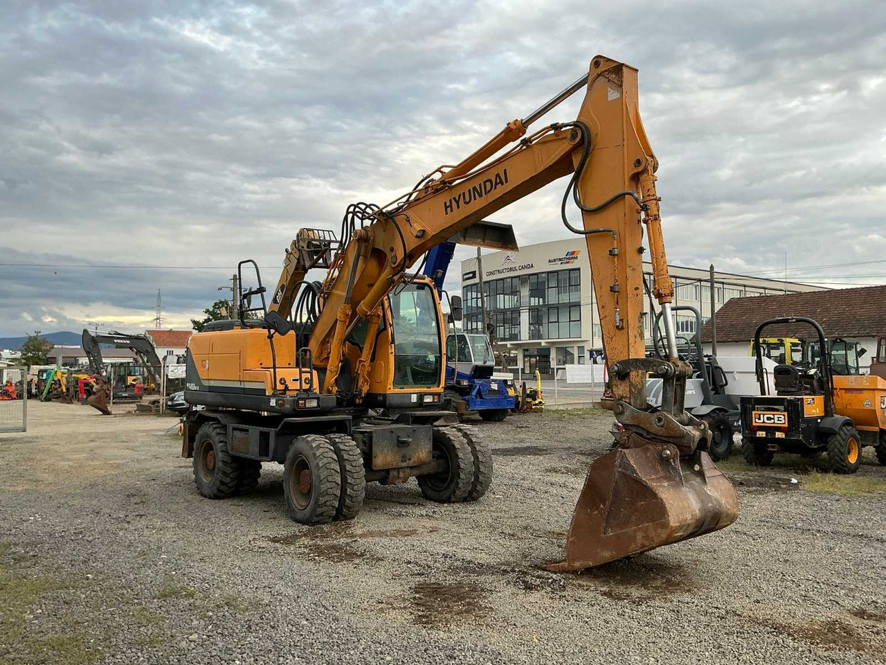 HYUNDAI ROBEX 140W-9 - Колёсный экскаватор: фото 4 HYUNDAI ROBEX 140W-9 - Колёсный экскаватор: фото 4