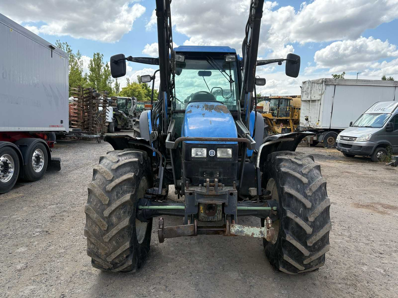 New Holland TM115 mit Frontlader - Трактор: фото 2 New Holland TM115 mit Frontlader - Трактор: фото 2