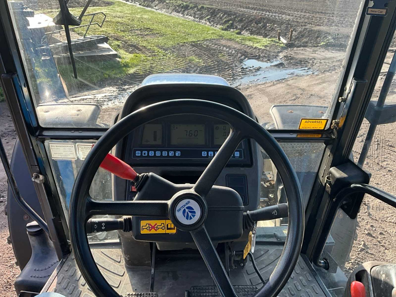 Трактор New Holland TM165: фото 30