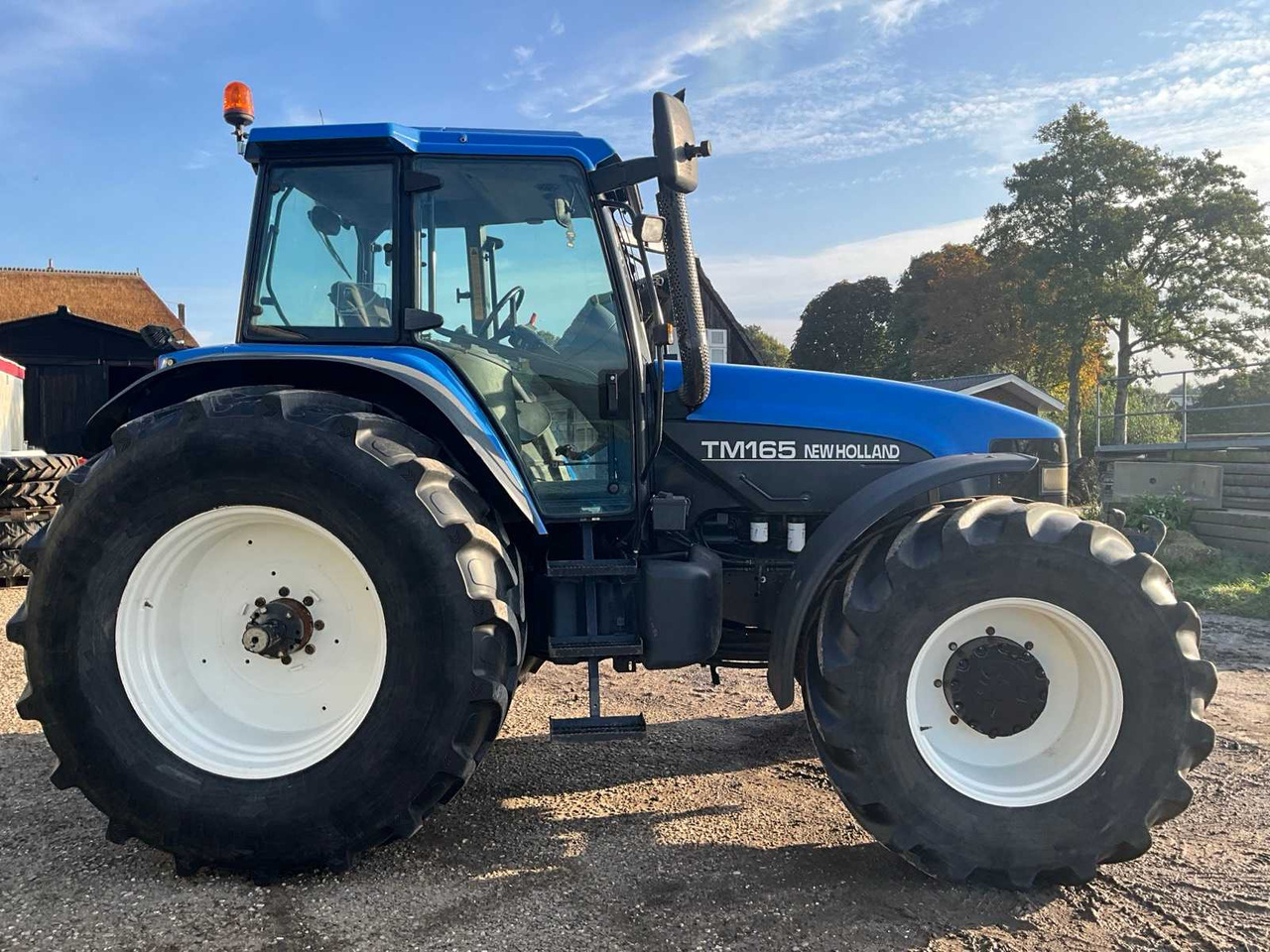 Трактор New Holland TM165: фото 6