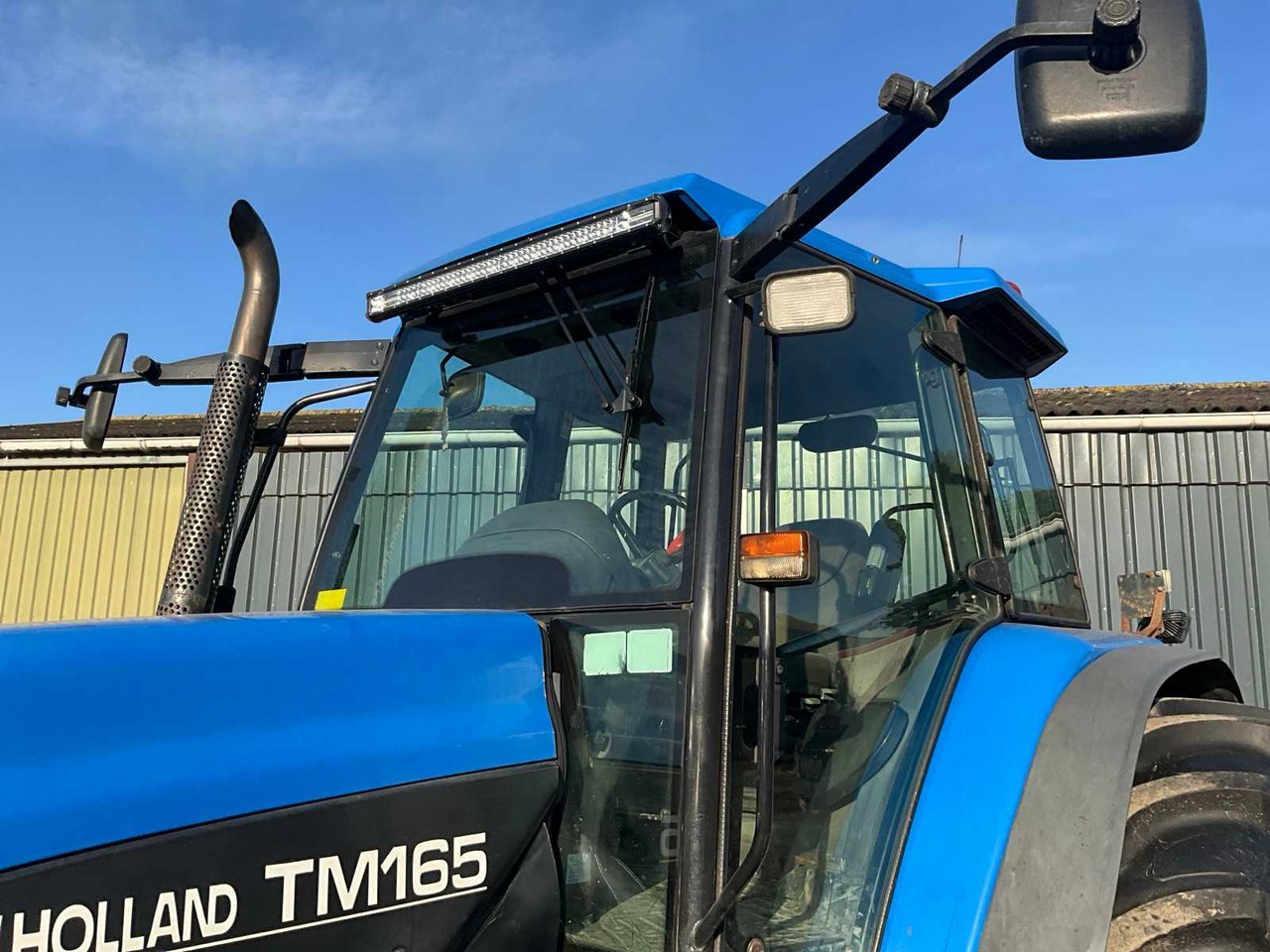 Трактор New Holland TM165: фото 15