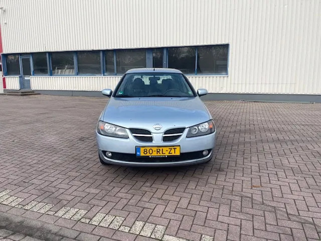 Nissan Almera Leder bekleding APK Cruise control - Хэтчбек: фото 2 Nissan Almera Leder bekleding APK Cruise control - Хэтчбек: фото 2