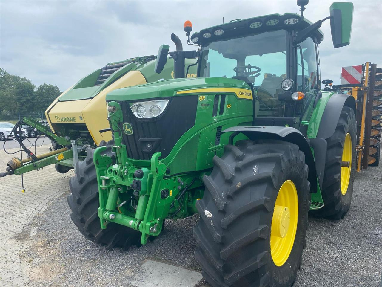 John Deere 6R 185 - Трактор: фото 1 John Deere 6R 185 - Трактор: фото 1