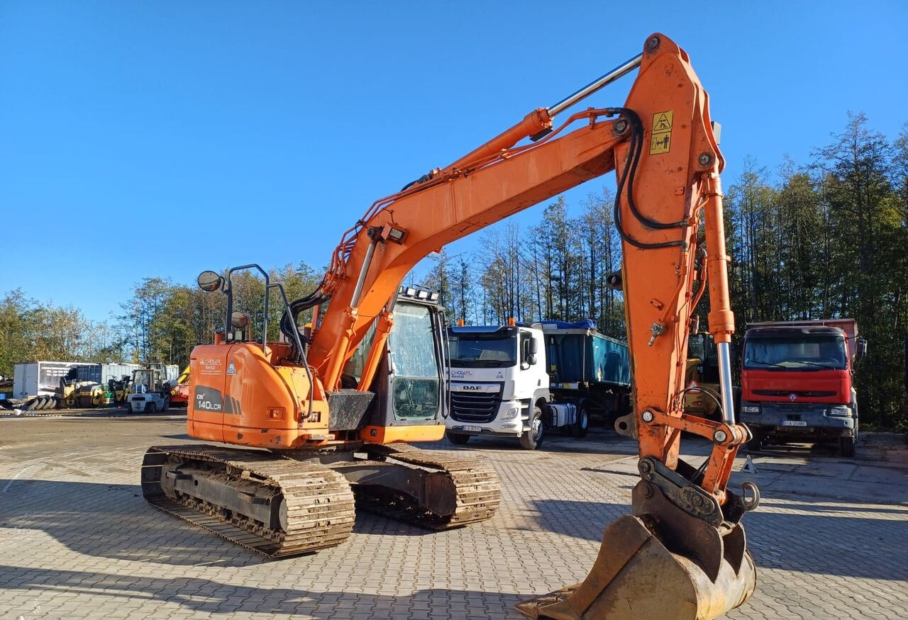 Doosan DX140LCR-3 - Гусеничный экскаватор: фото 3 Doosan DX140LCR-3 - Гусеничный экскаватор: фото 3