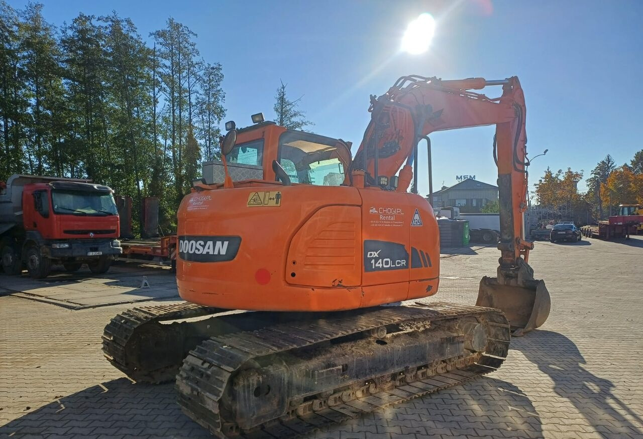 Doosan DX140LCR-3 - Гусеничный экскаватор: фото 5 Doosan DX140LCR-3 - Гусеничный экскаватор: фото 5