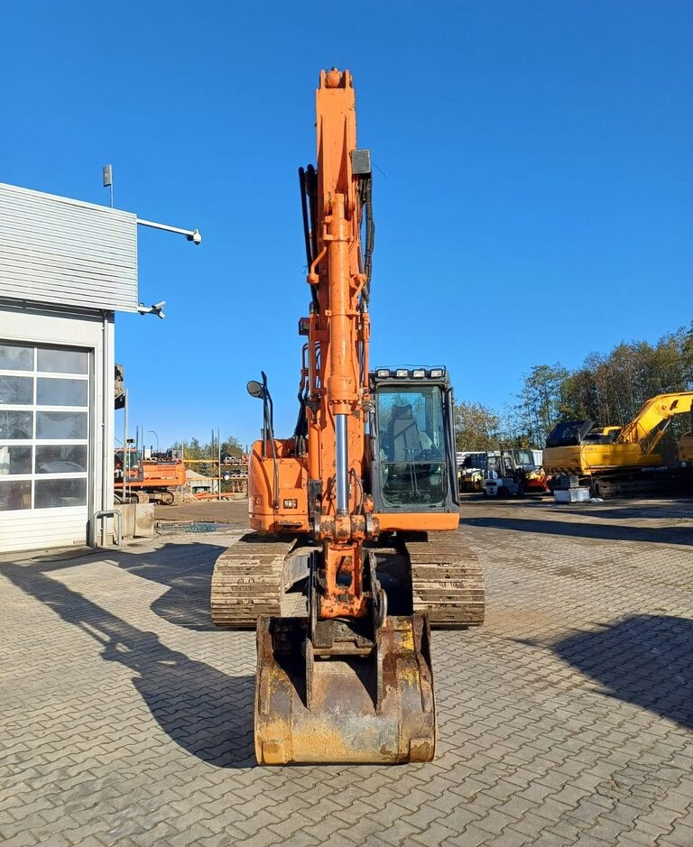 Doosan DX140LCR-3 - Гусеничный экскаватор: фото 2 Doosan DX140LCR-3 - Гусеничный экскаватор: фото 2