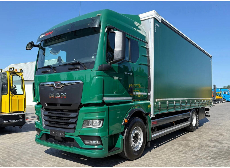 MAN TGX 18.470 - Curtain side - Тентованный грузовик: фото 1 MAN TGX 18.470 - Curtain side - Тентованный грузовик: фото 1