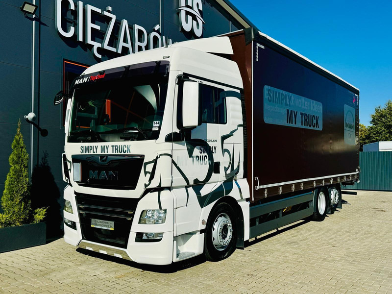 MAN TGX 26.420 - Тентованный грузовик: фото 1 MAN TGX 26.420 - Тентованный грузовик: фото 1