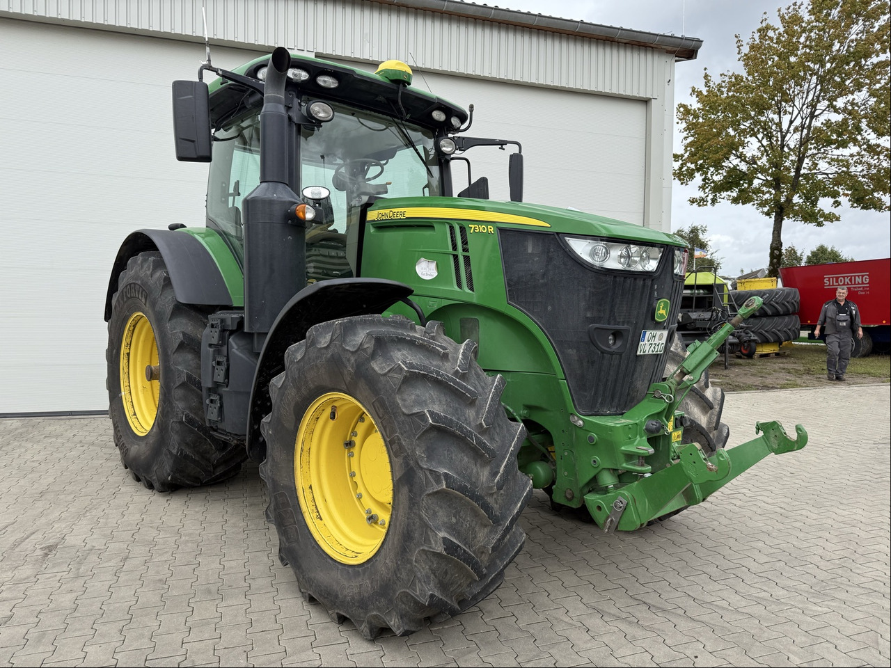 John Deere 7310R E23 - Трактор: фото 1 John Deere 7310R E23 - Трактор: фото 1