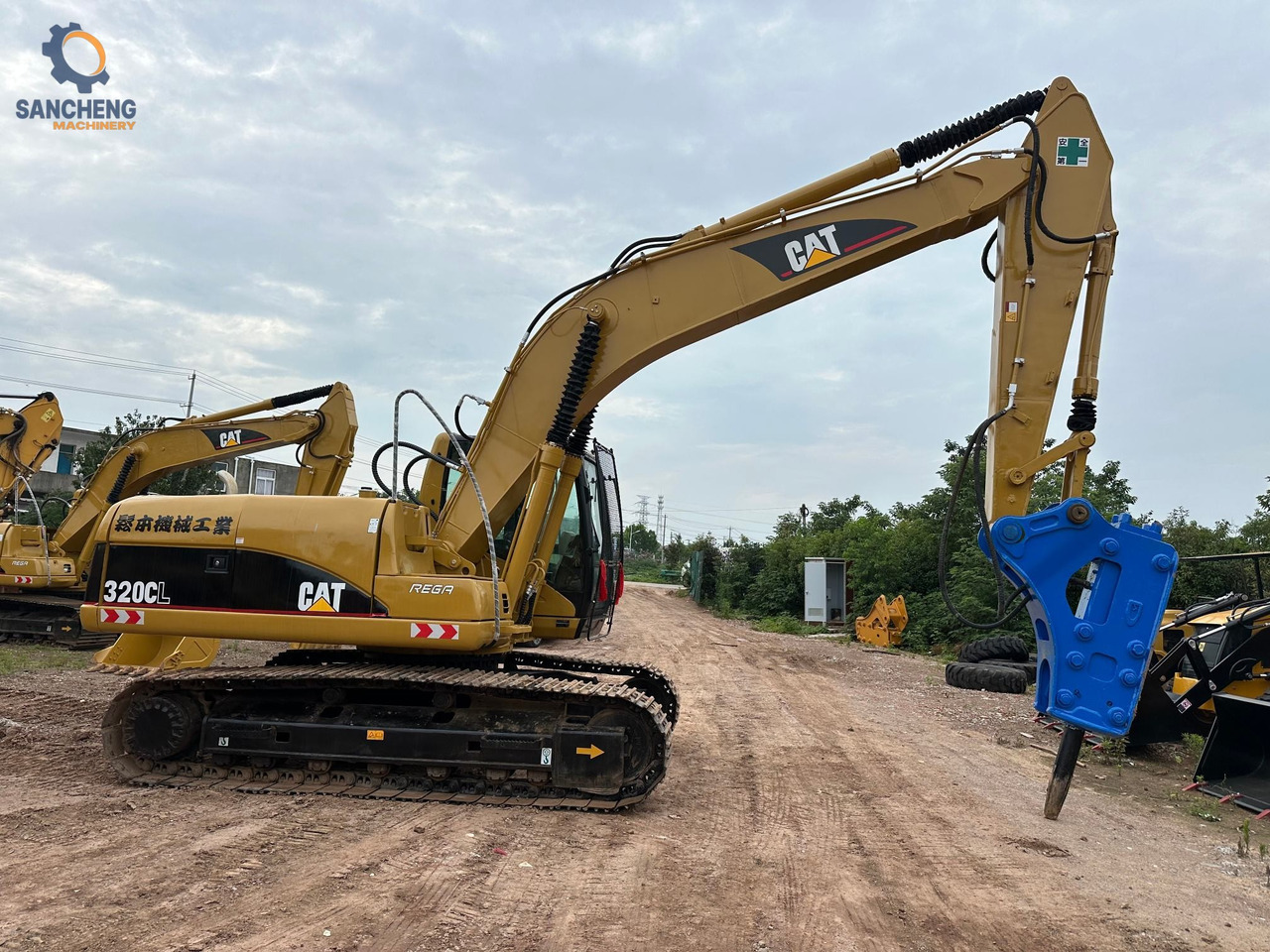 CAT 320CL with hammer - Гусеничный экскаватор: фото 1 CAT 320CL with hammer - Гусеничный экскаватор: фото 1