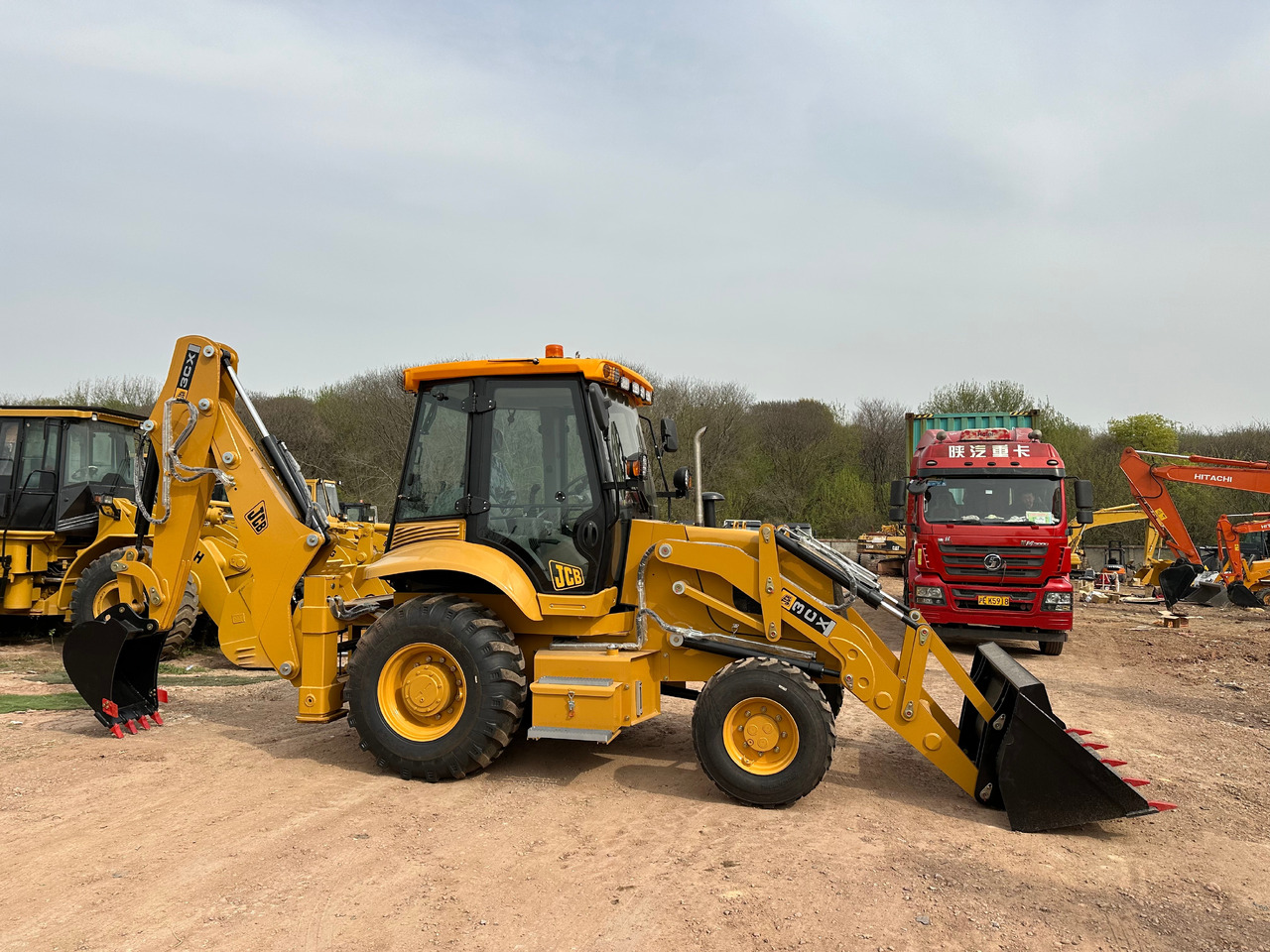 JCB 3CX - Экскаватор-погрузчик: фото 1 JCB 3CX - Экскаватор-погрузчик: фото 1