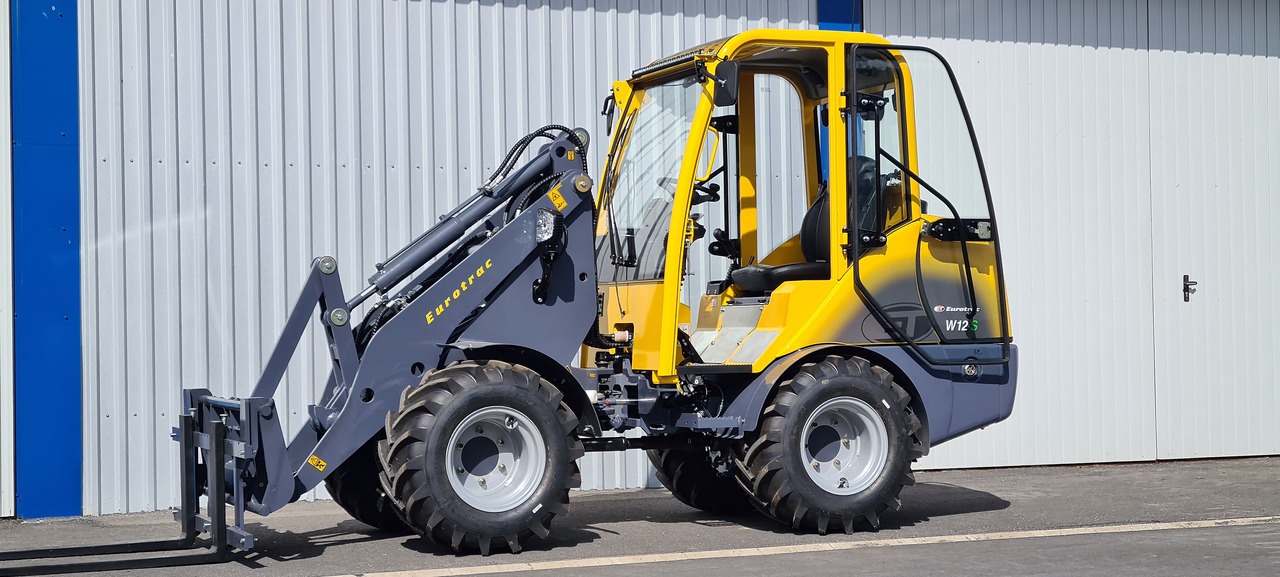 Eurotrac W12 Radlader Hoflader - Компактный фронтальный погрузчик: фото 3 Eurotrac W12 Radlader Hoflader - Компактный фронтальный погрузчик: фото 3