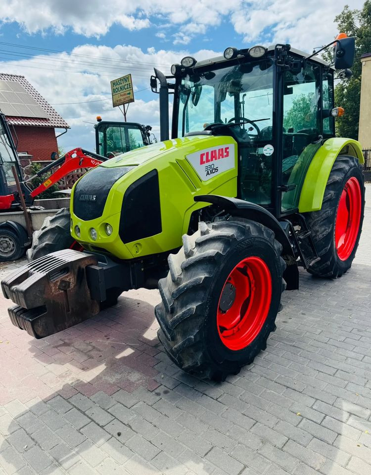 Claas Axos 330 - Трактор: фото 5 Claas Axos 330 - Трактор: фото 5
