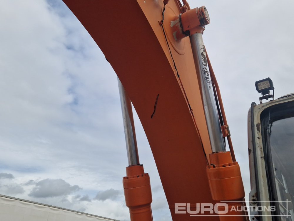 Гусеничный экскаватор Hitachi EX135: фото 19