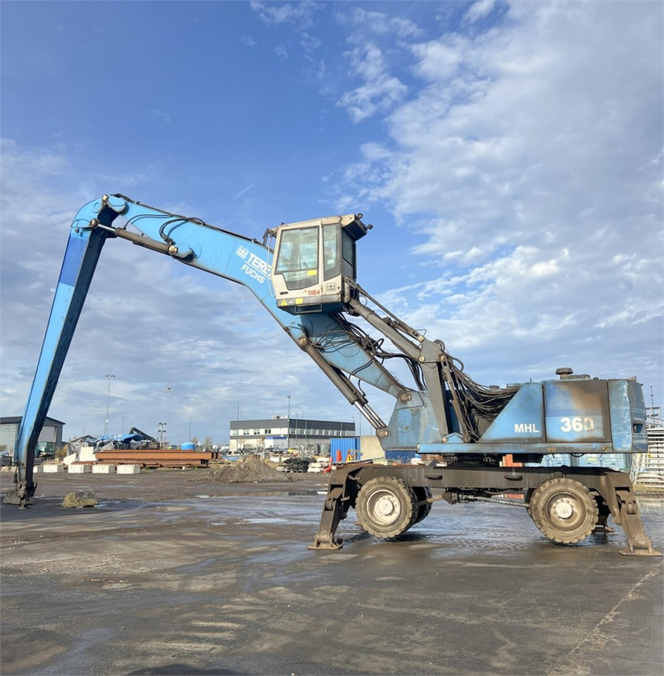 Fuchs MHL 360 - Перегружатель: фото 1 Fuchs MHL 360 - Перегружатель: фото 1