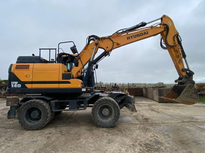 Hyundai HW 140 - Колёсный экскаватор: фото 2 Hyundai HW 140 - Колёсный экскаватор: фото 2