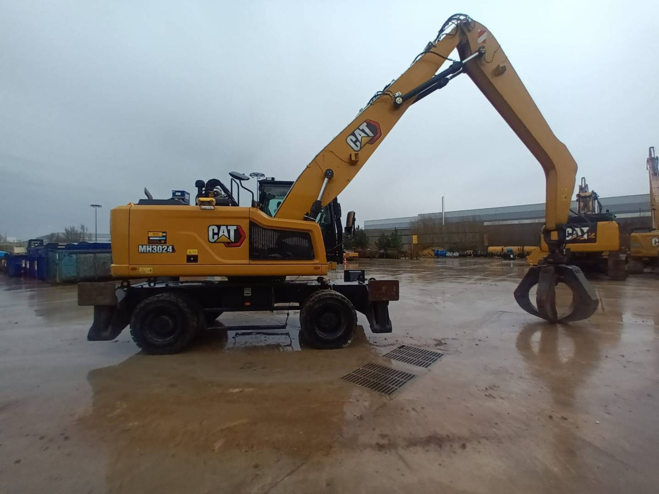 Колёсный экскаватор CAT MH3024-1: фото 8