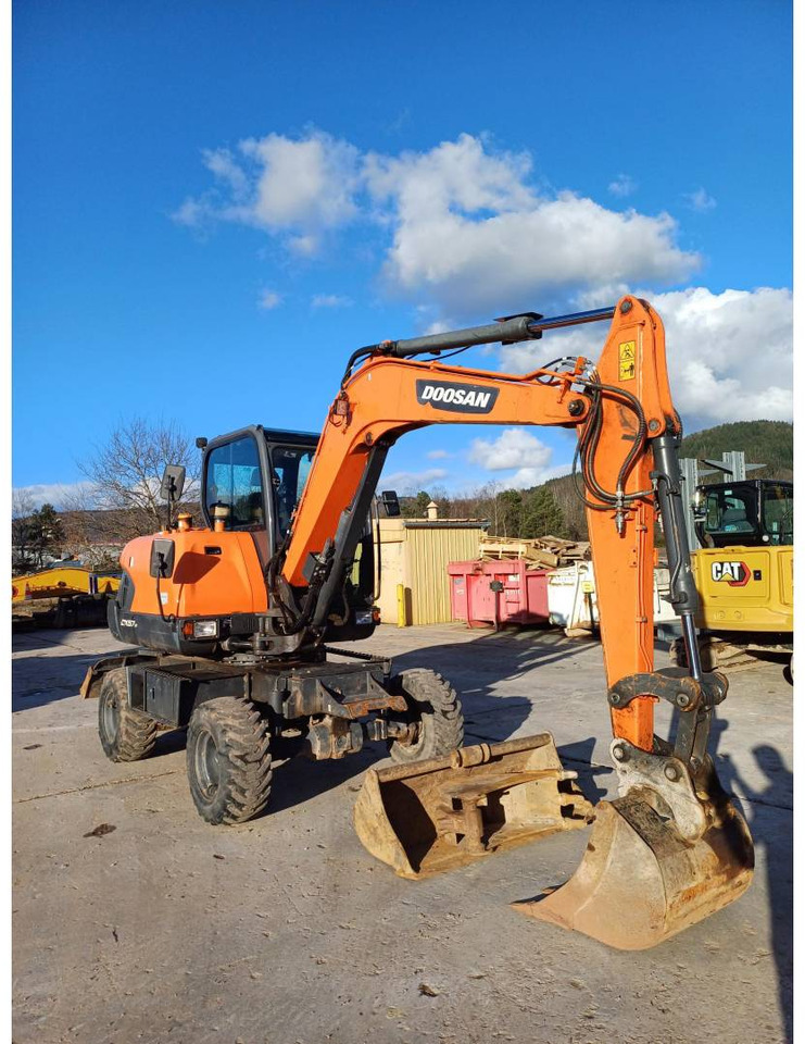 DOOSAN INFRACORE AMERICA CORP. DX57W-7 - Колёсный экскаватор: фото 2 DOOSAN INFRACORE AMERICA CORP. DX57W-7 - Колёсный экскаватор: фото 2
